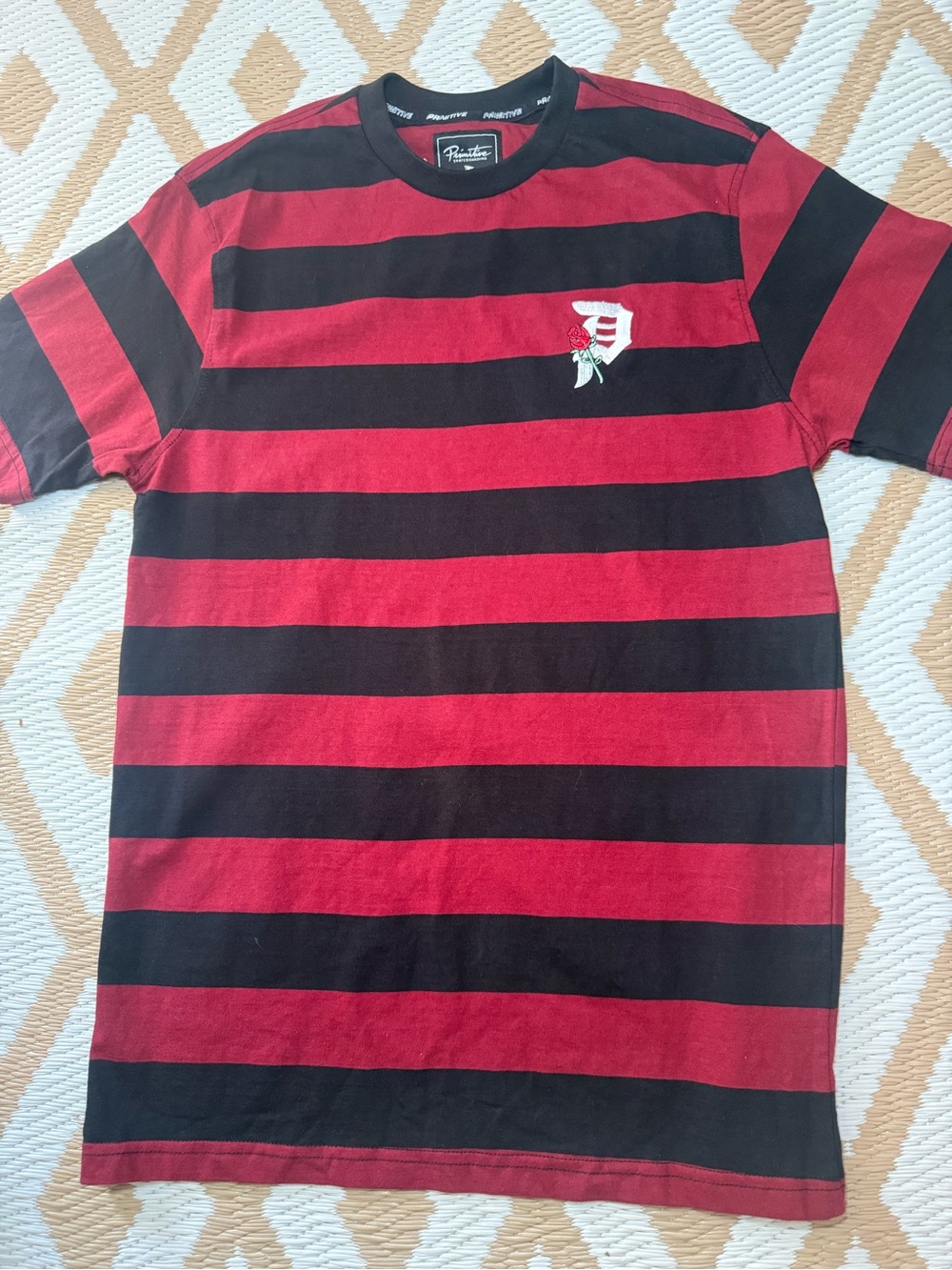 Primitive Skateboarding Red Black
Striped Embroidered Logo Tee Men's S